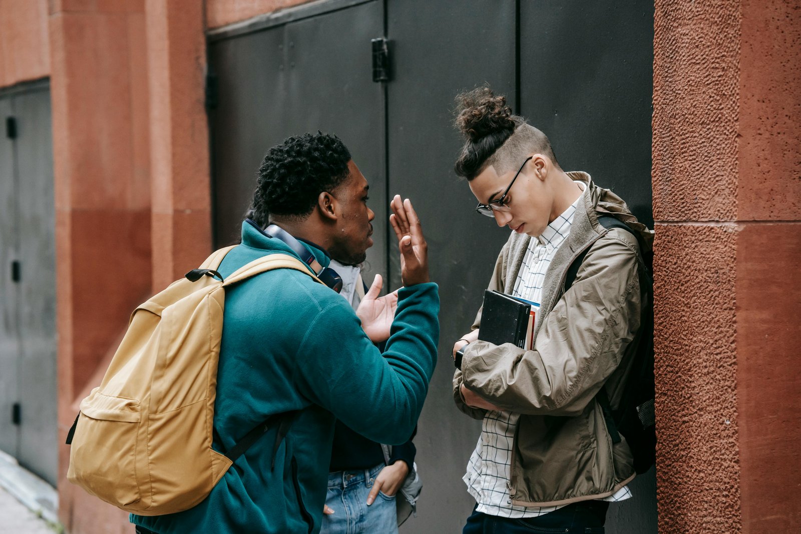 Two students engaged in a serious discussion – Criticisms of Woke Education.