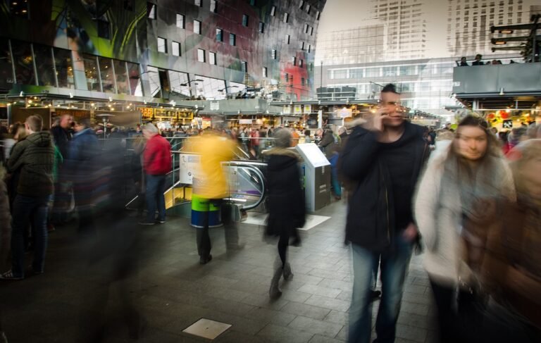 a group of people walking in a busy area - Consumer sovereignty and the ethics of recognition