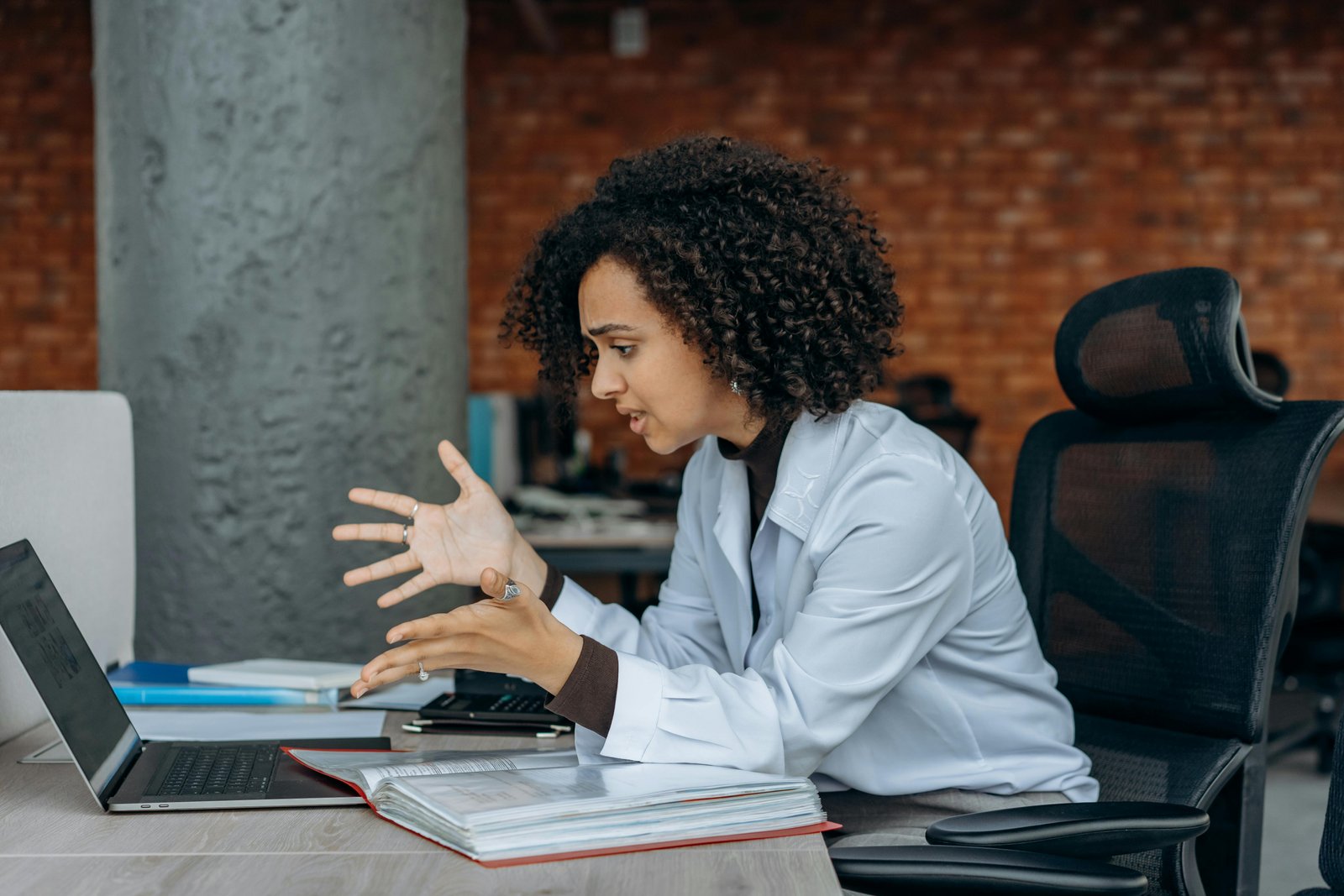 Entrepreneur discussing strategies for Small Business Success during an online meeting.