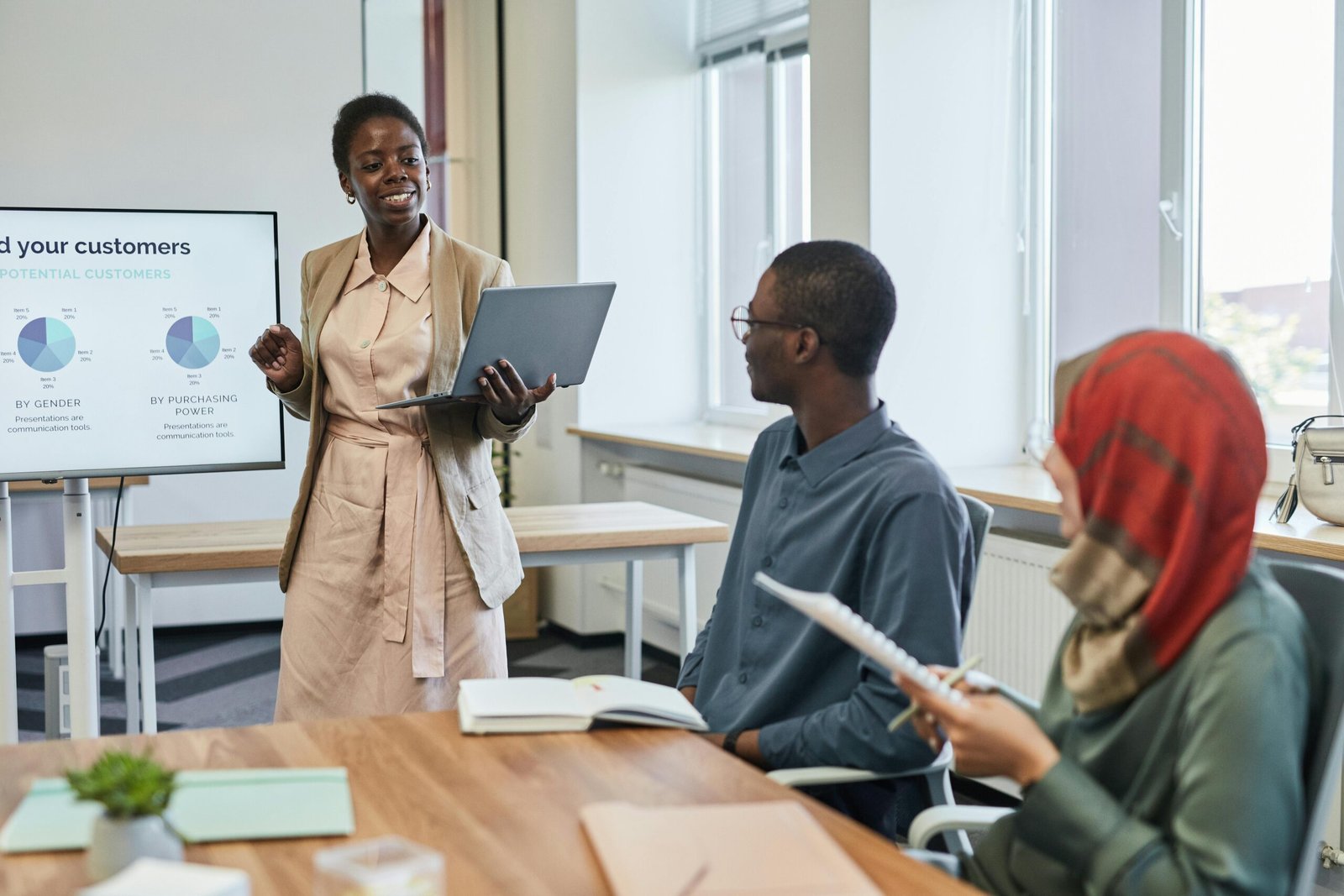 Professional presenting a corporate strategic planning report to a team.