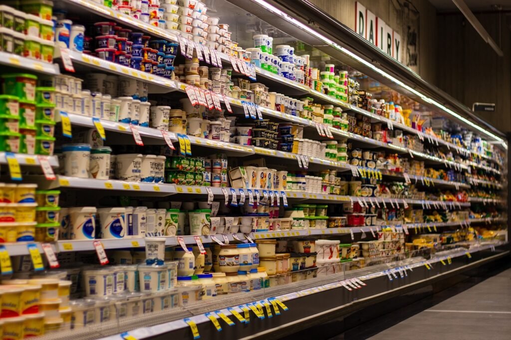 a grocery store with shelves full of dairy products