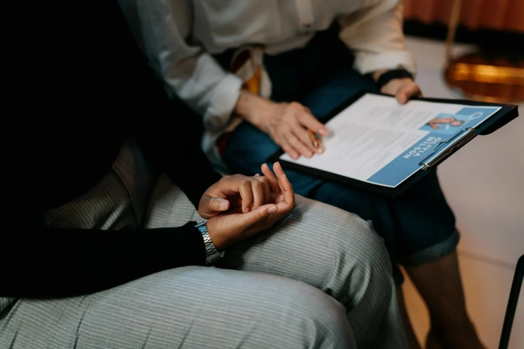 a person holding a clipboard - do government agencies get tax cuts for dei
