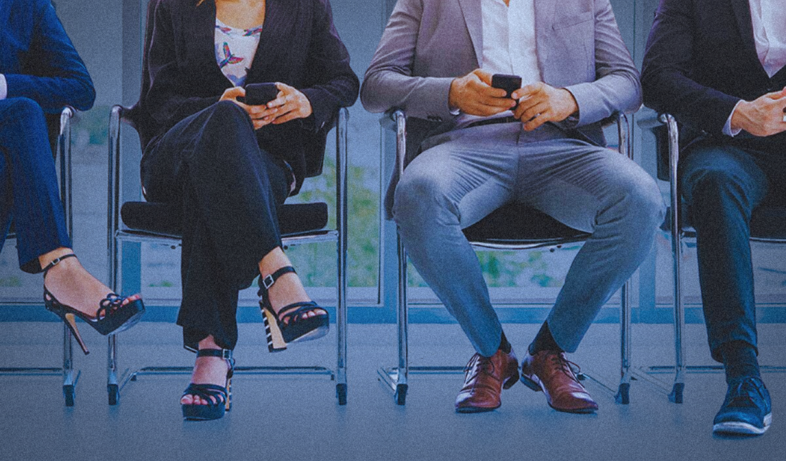 people sitting on chairs - what is a dei hire