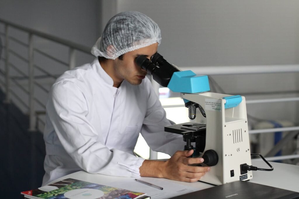 man using lab equipment -  NIH dei