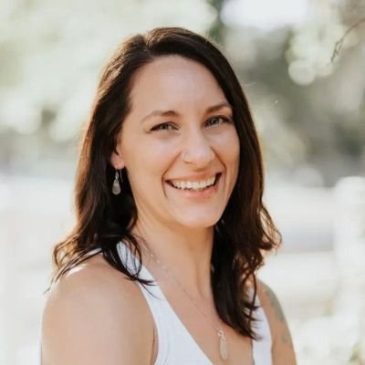 a woman smiling at the camera