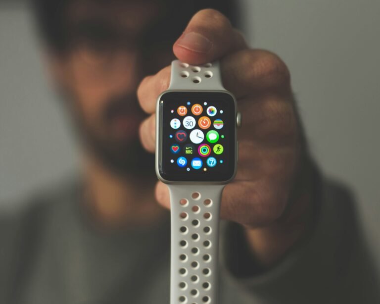 Hand holding a smart watch