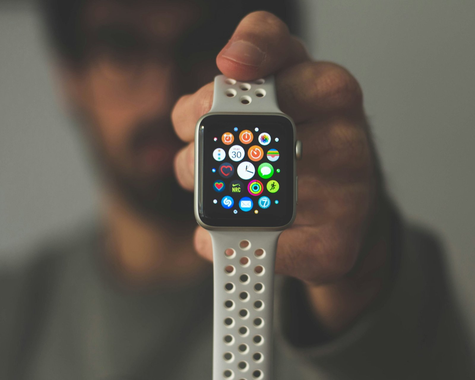Hand holding a smart watch