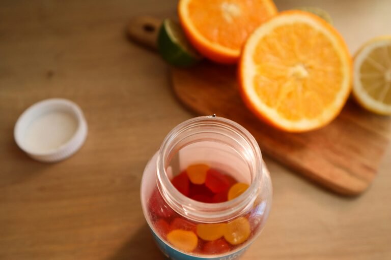 Vitamins and sliced oranges