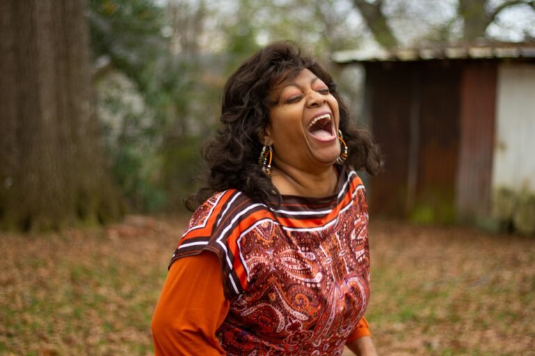Black older woman laughing