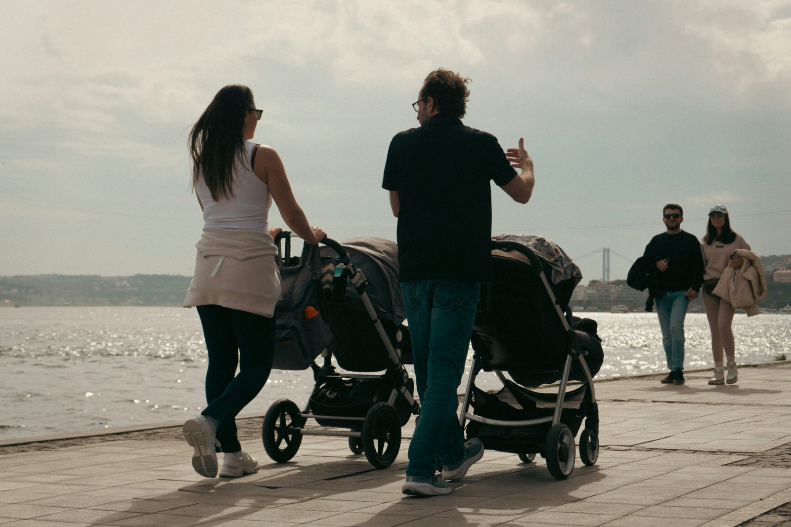 Man and woman with strollers