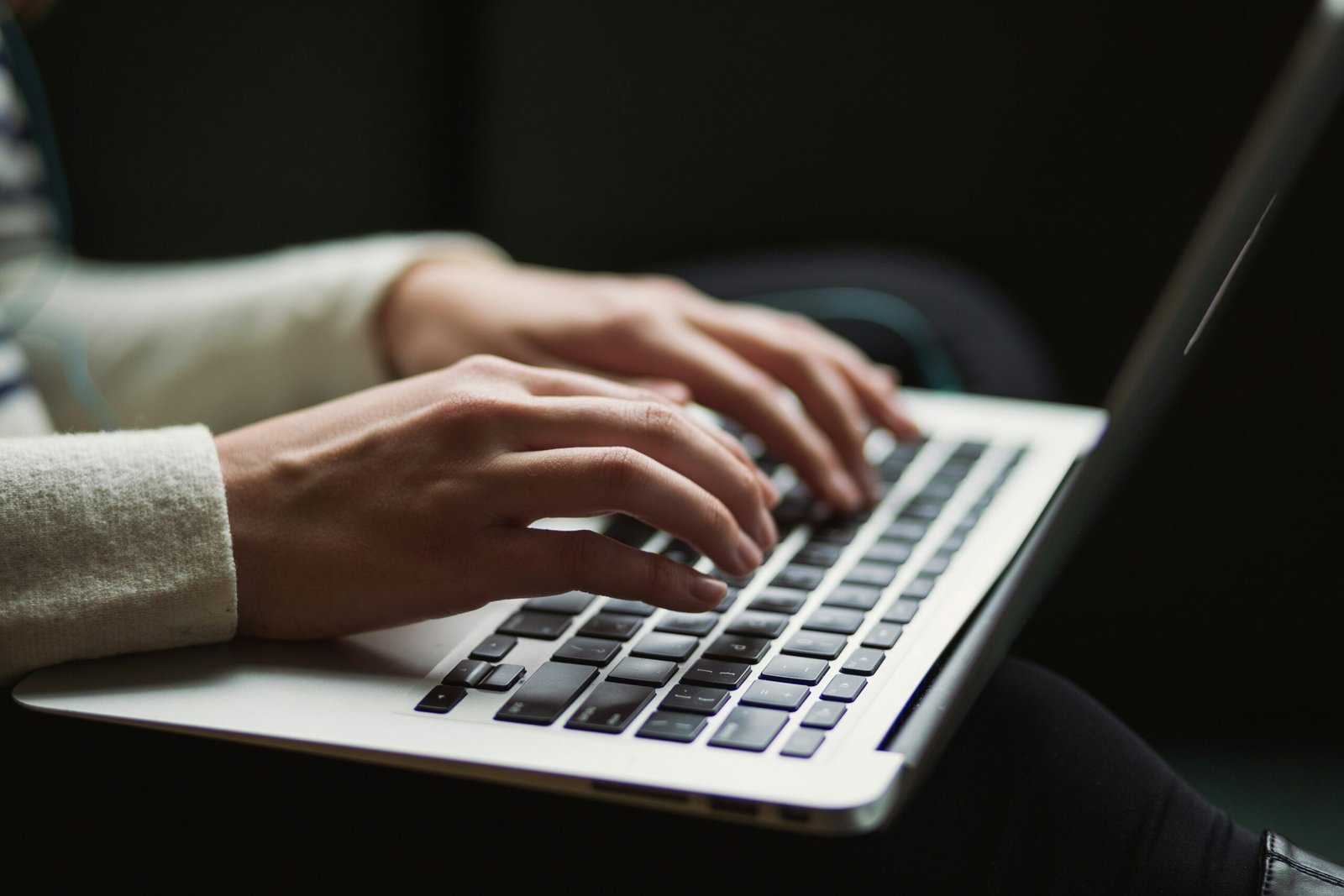 Hand on a laptop