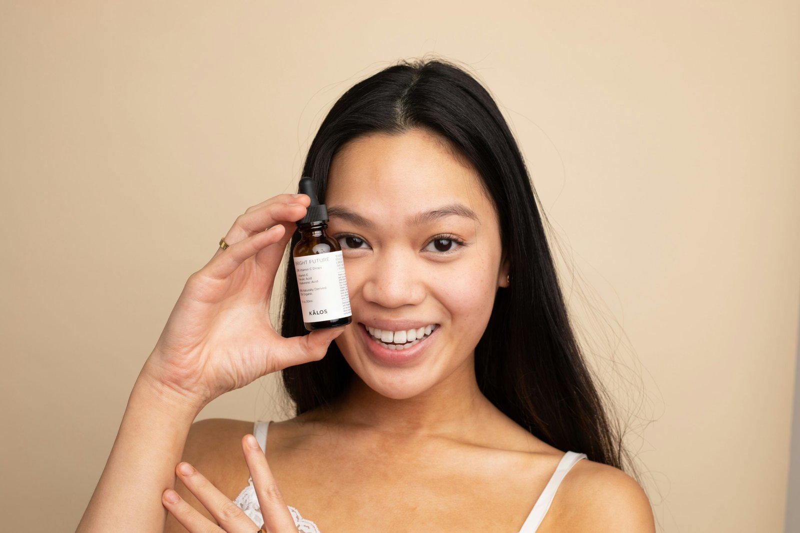 Woman holding a serum