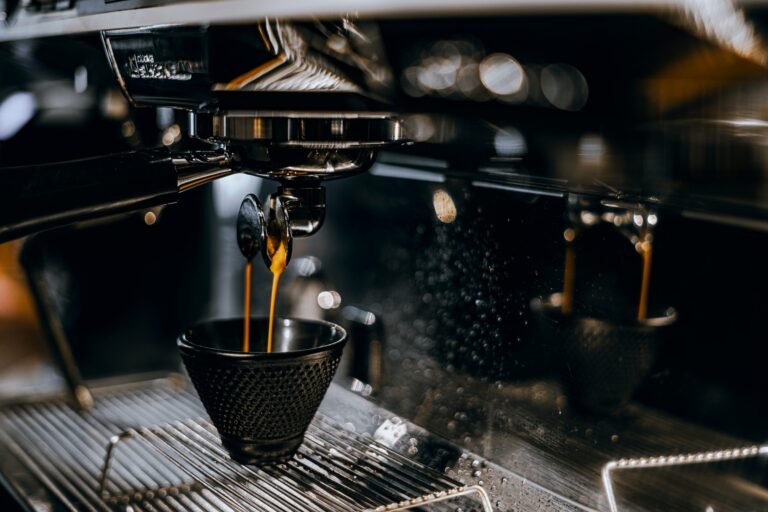Espresso machine pouring out coffee