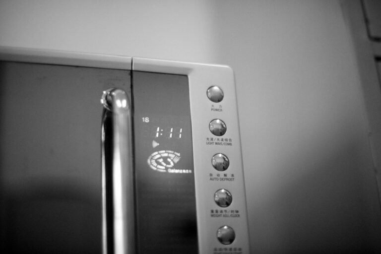 Black and white photo of a microwave