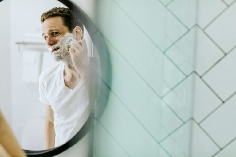 Man washing his face