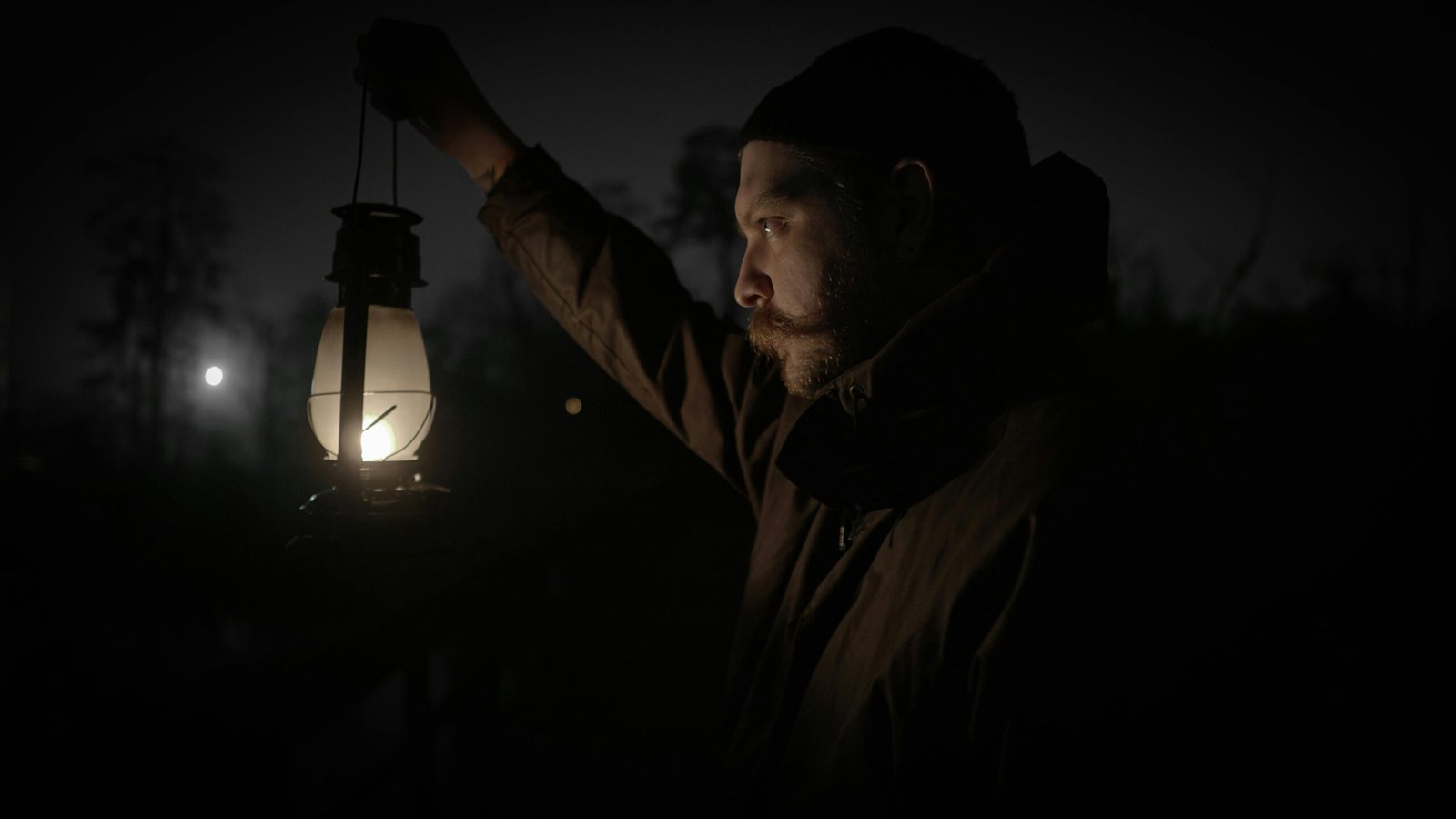 Man holding a lantern