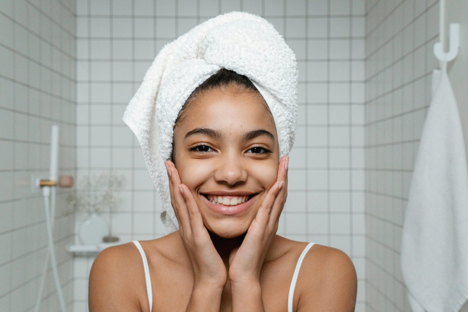 Smiling woman with a tied towel on her head