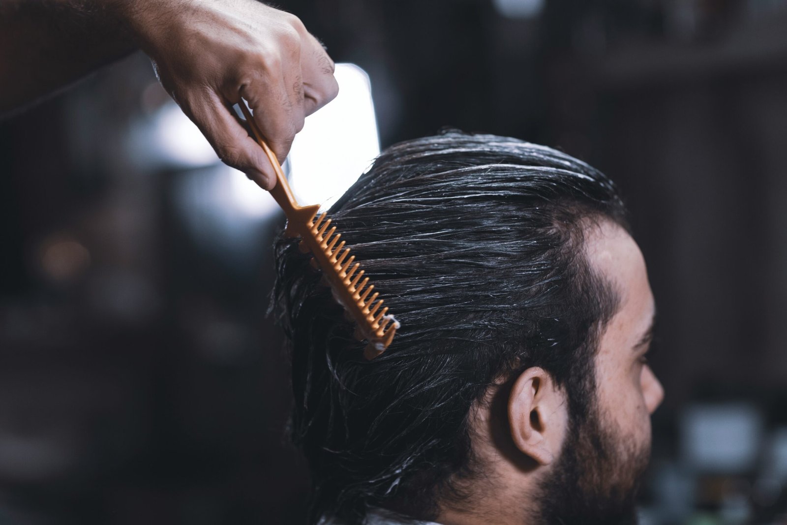 A man with a slick back