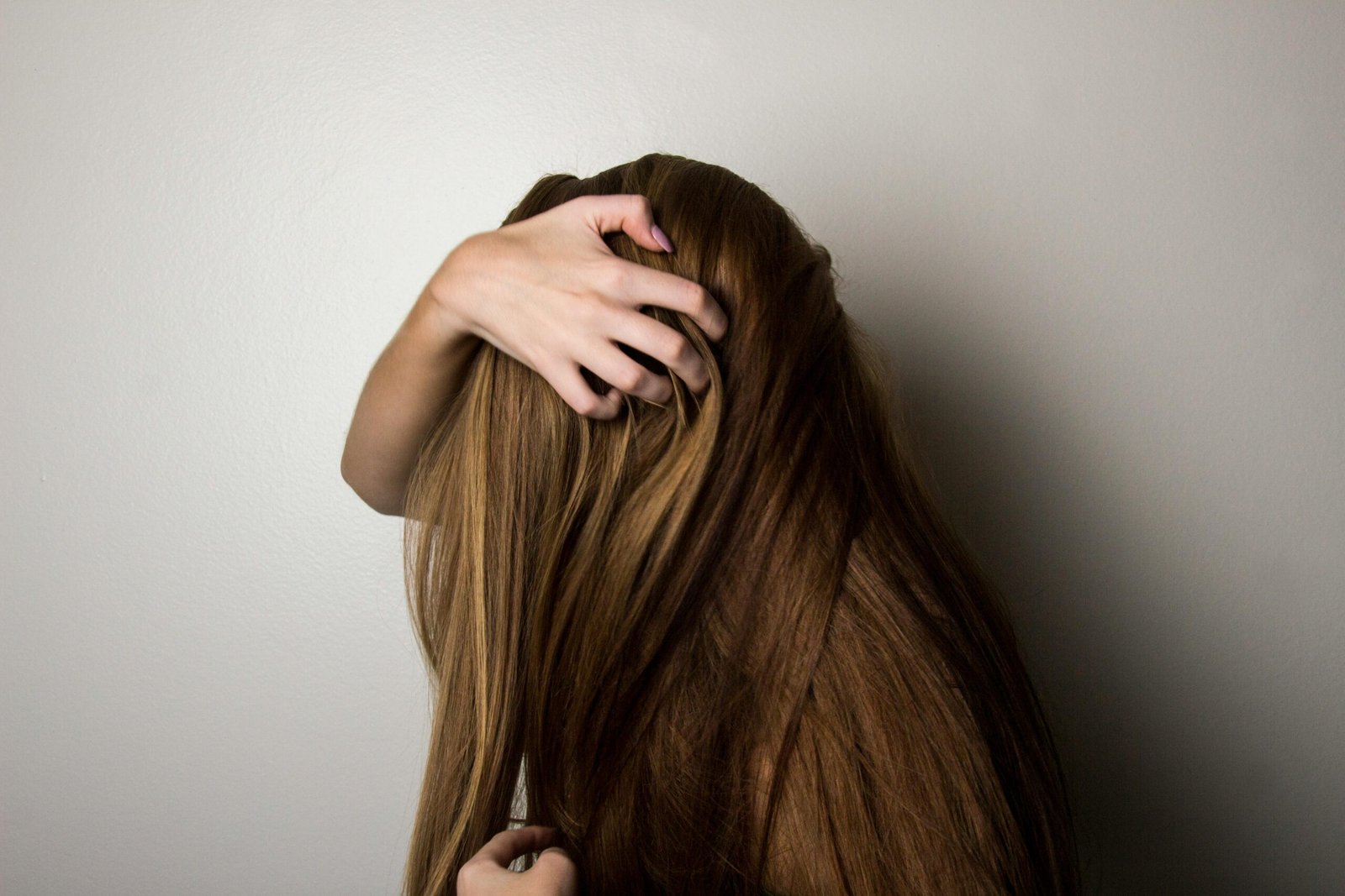 woman itching her hair